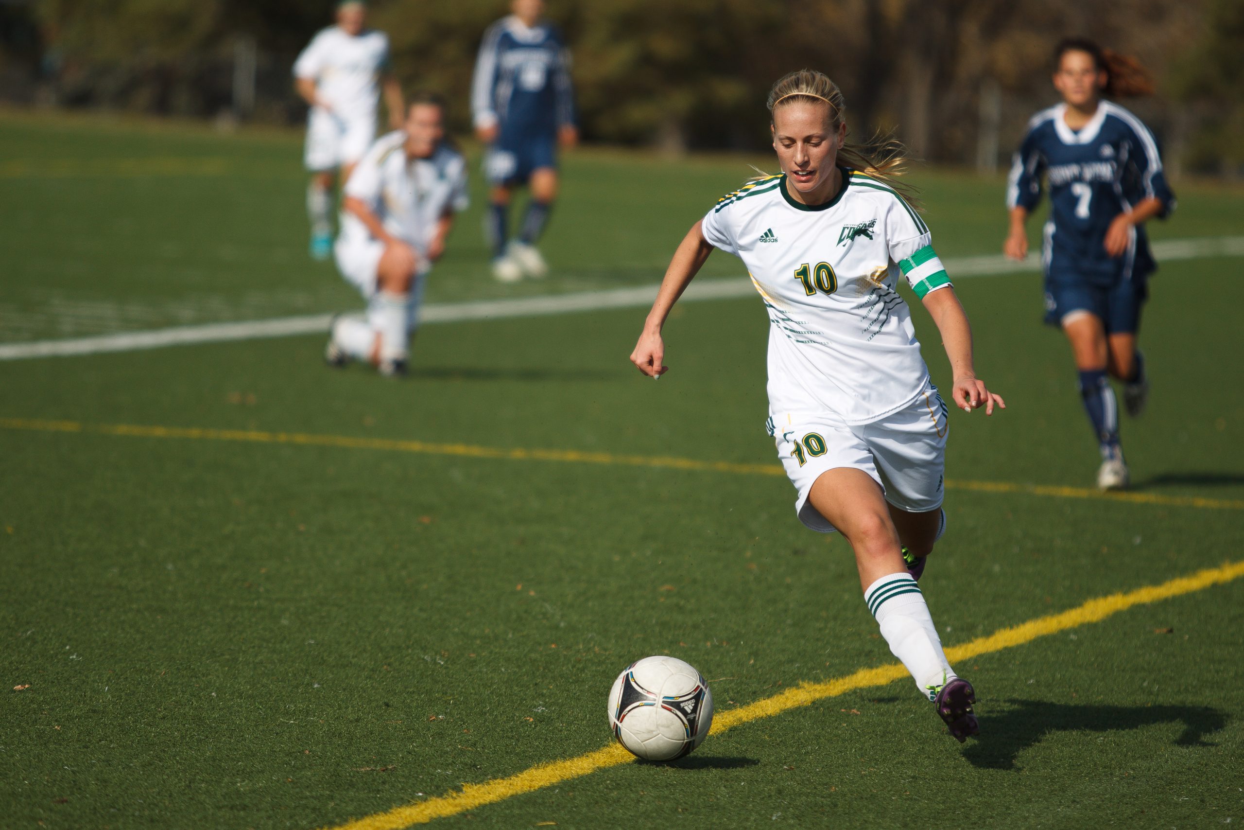 Individual on soccer pitch.